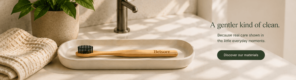 Beisorr natural wooden toothbrush resting on ceramic tray in morning sunlit bathroom - A gentler kind of clean